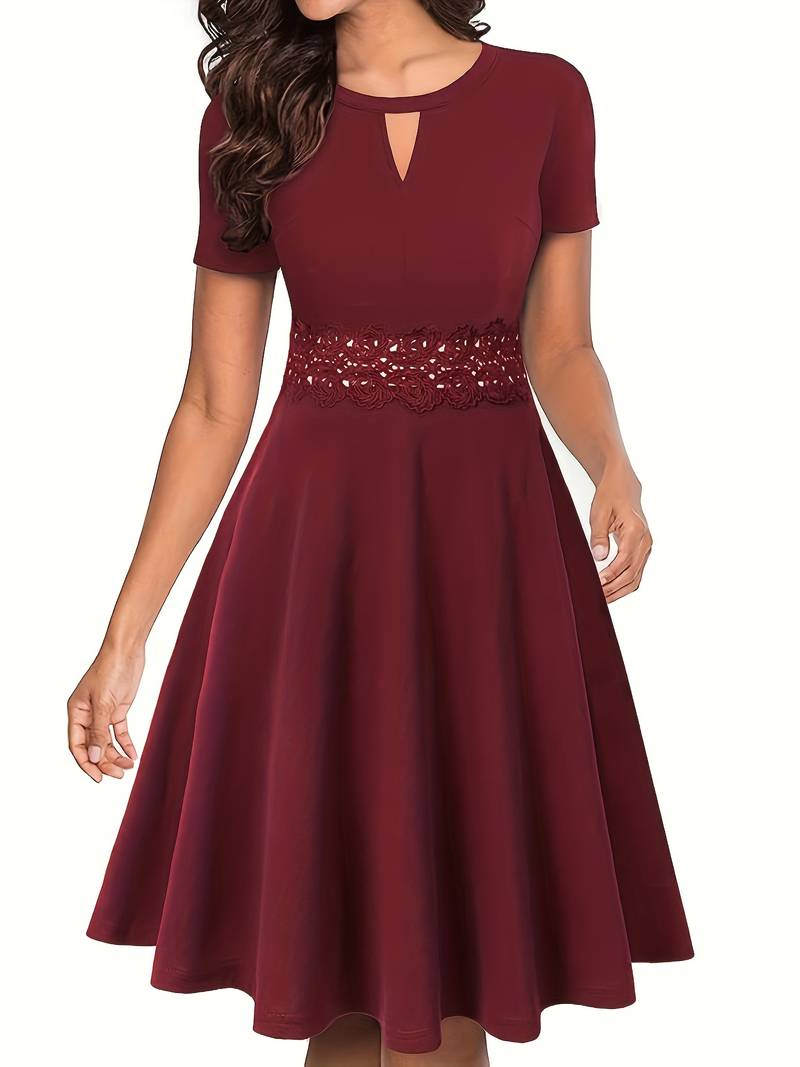 Blue Dress with Lace Accents and Tailored Waist