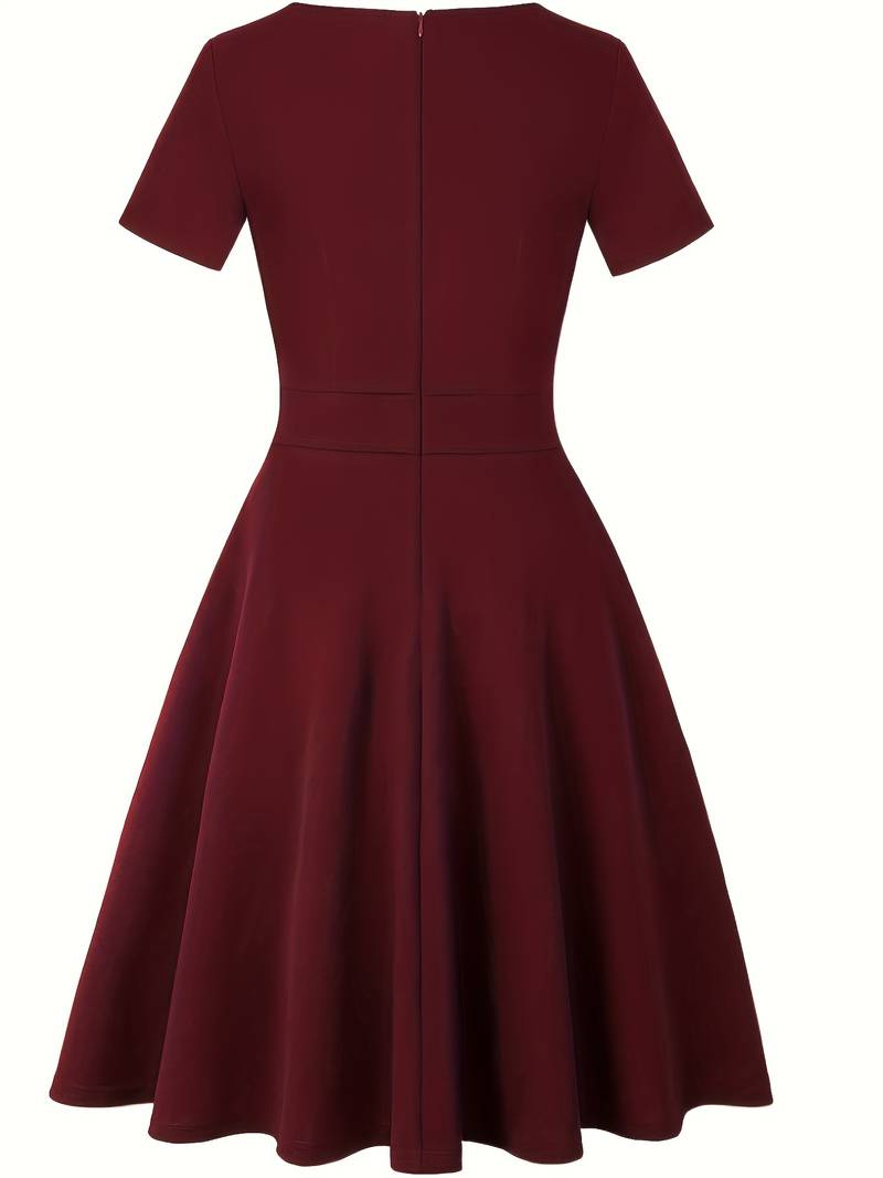 Blue Dress with Lace Accents and Tailored Waist